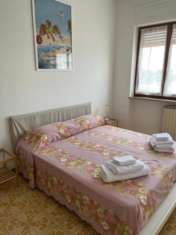 Postel nebo postele na pokoji v ubytování B&B Del Porto