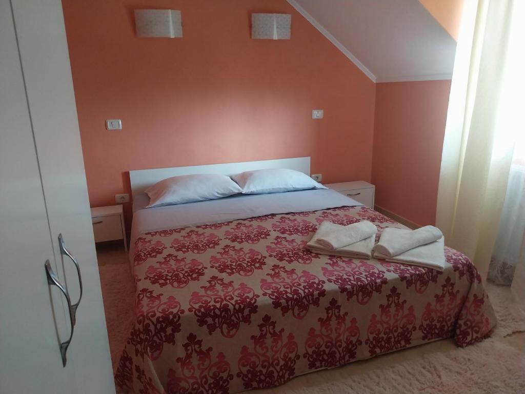 Postel nebo postele na pokoji v ubytování Serena House