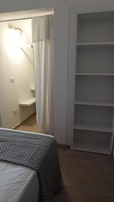 Postel nebo postele na pokoji v ubytování Kasa di Yo