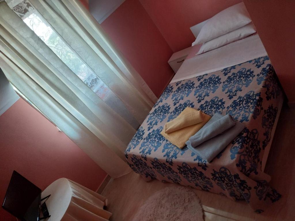Postel nebo postele na pokoji v ubytování Serena House