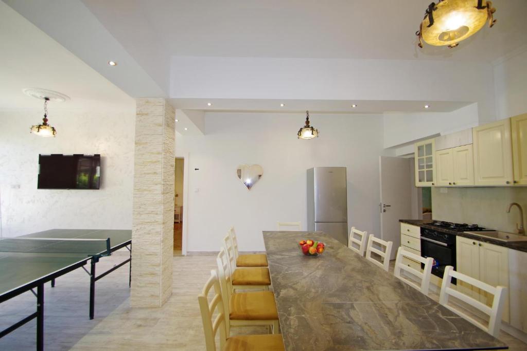 Kuchyň nebo kuchyňský kout v ubytování Apartman Gortanova uvala
