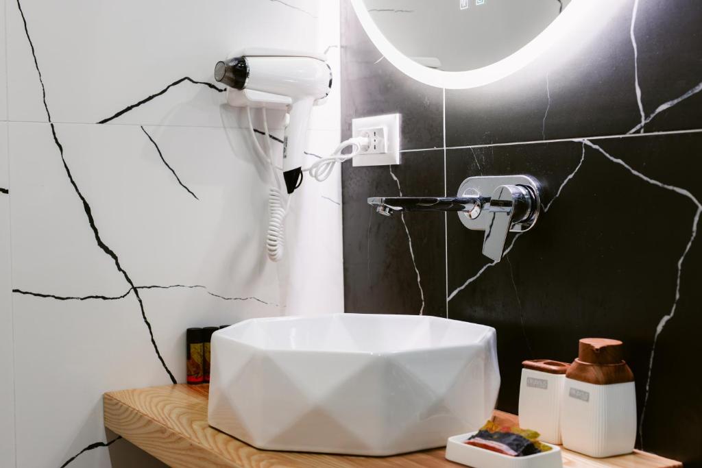 Koupelna v ubytování Hotel Olsi