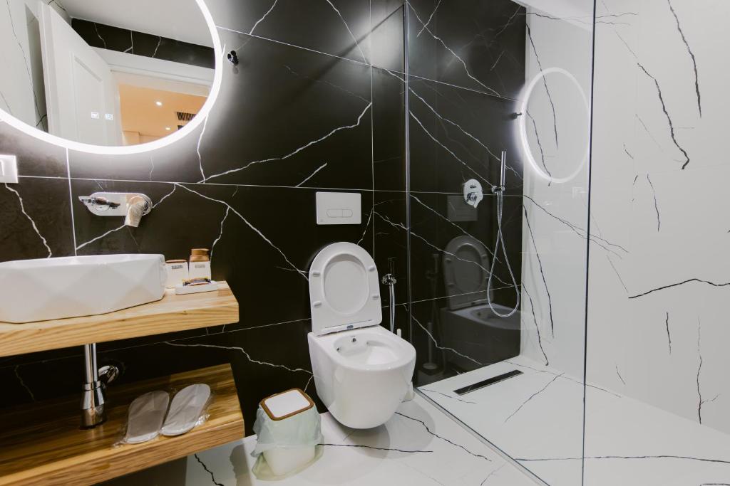 Koupelna v ubytování Hotel Olsi