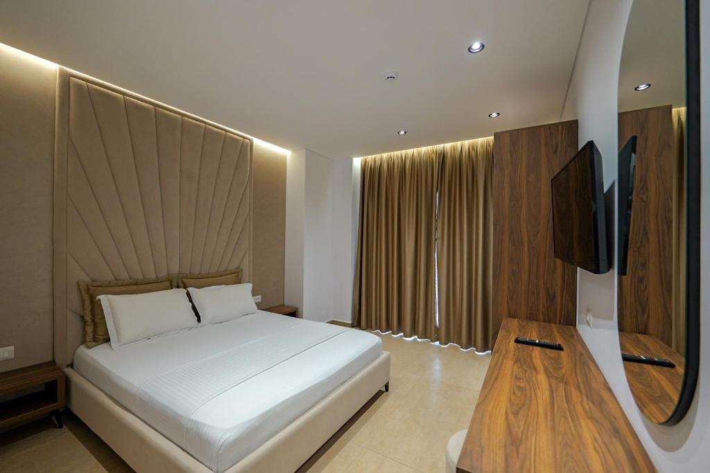 TV a/nebo společenská místnost v ubytování Sunlight Hotel