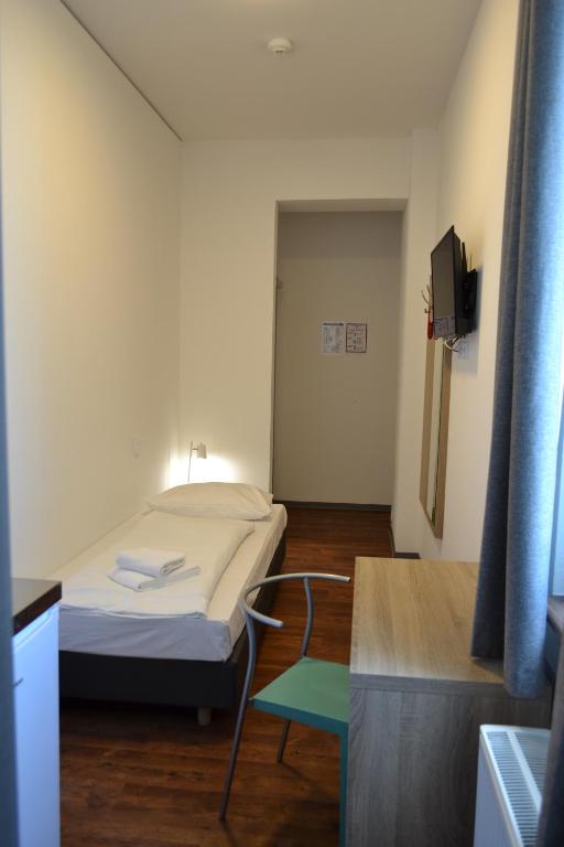 TV a/nebo společenská místnost v ubytování Queens Residenz