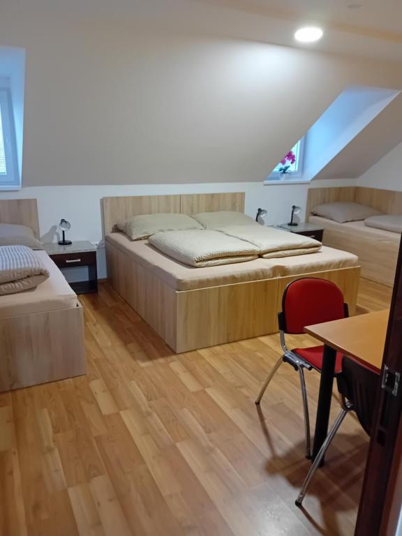 Postel nebo postele na pokoji v ubytování Penzión Marcel