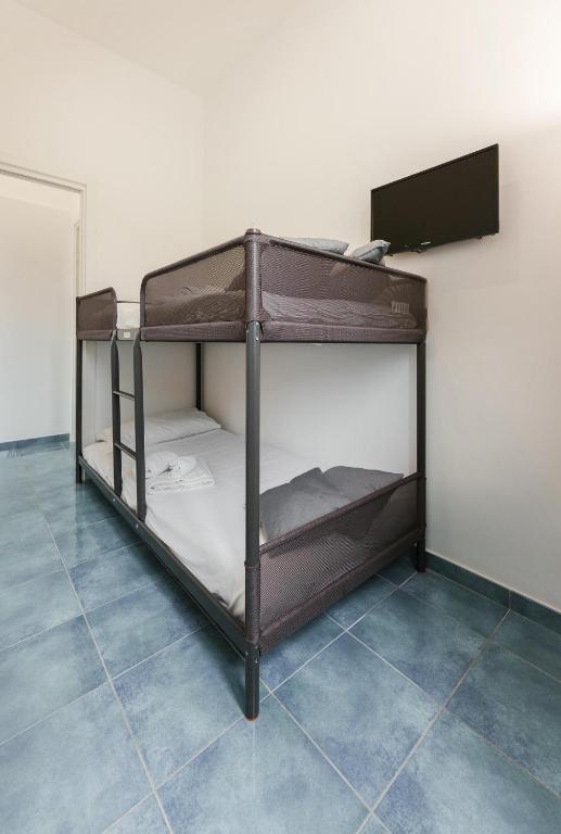 Postel nebo postele na pokoji v ubytování Il Poeta nella Vigna