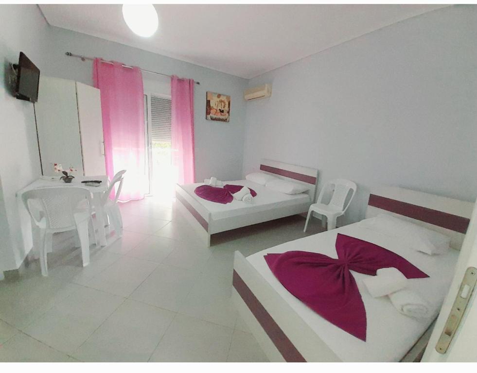 Letto o letti in una camera di GB Rooms