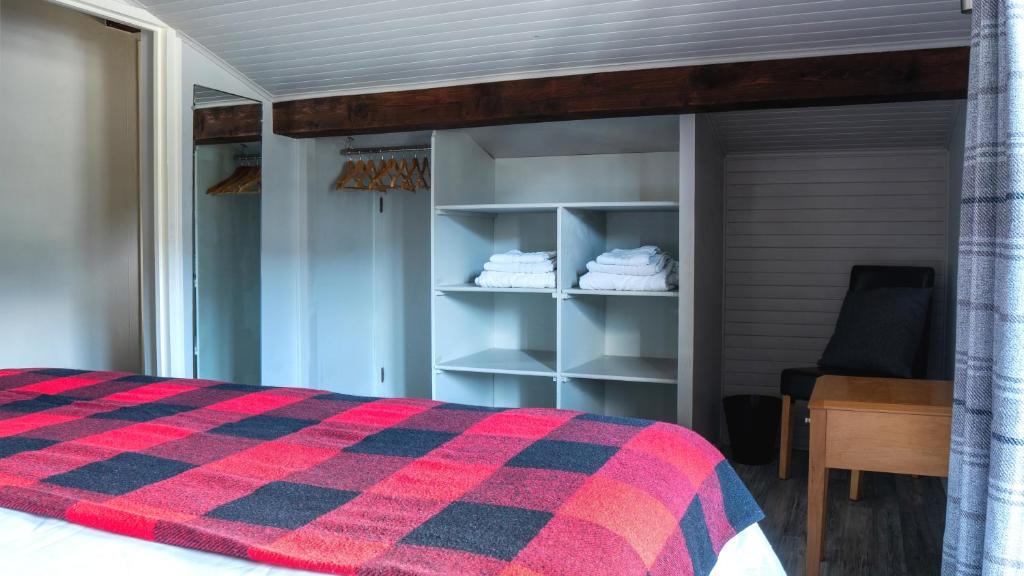 Postel nebo postele na pokoji v ubytování Hotel La Renardière Morzine