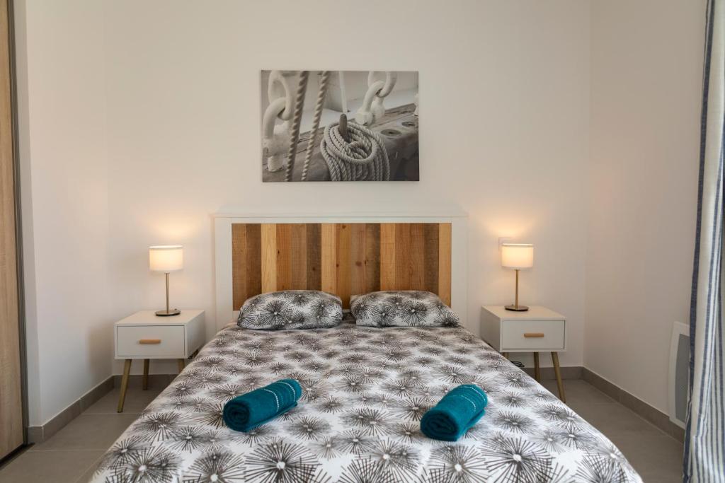 Postel nebo postele na pokoji v ubytování MY Hôtel Résidences - Port Leucate