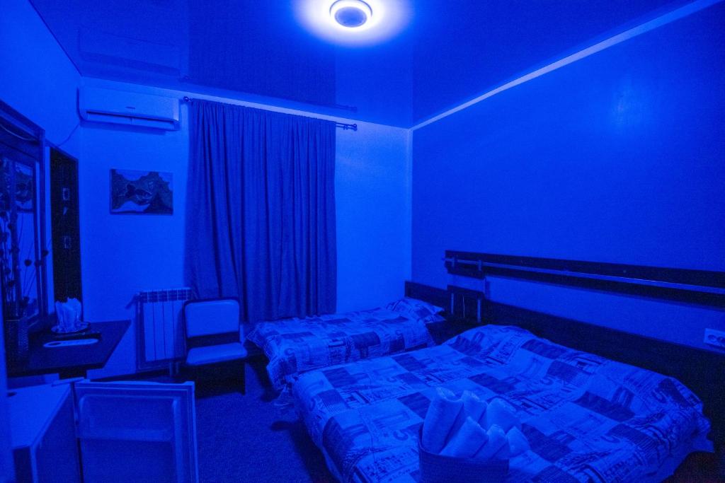 Postel nebo postele na pokoji v ubytování PENSIUNEA LAINER