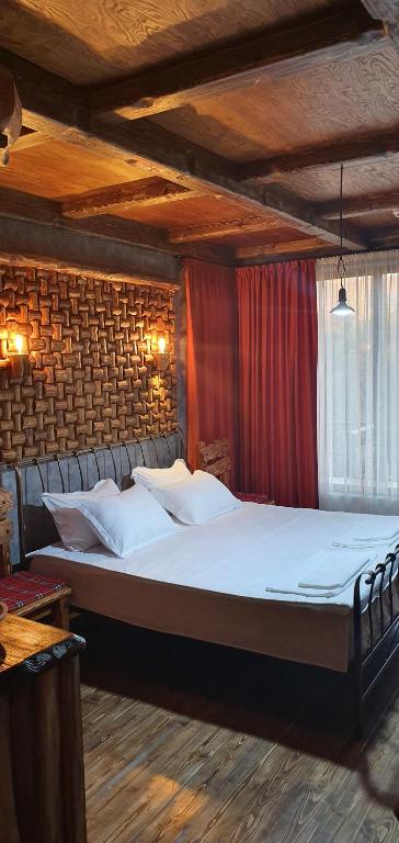 Postel nebo postele na pokoji v ubytování Hotel Riverside Inn