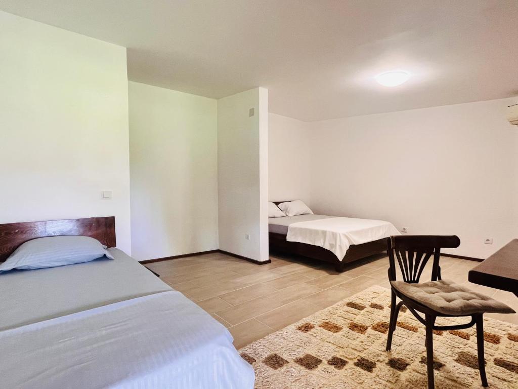 Postel nebo postele na pokoji v ubytování Balabani Local Stay