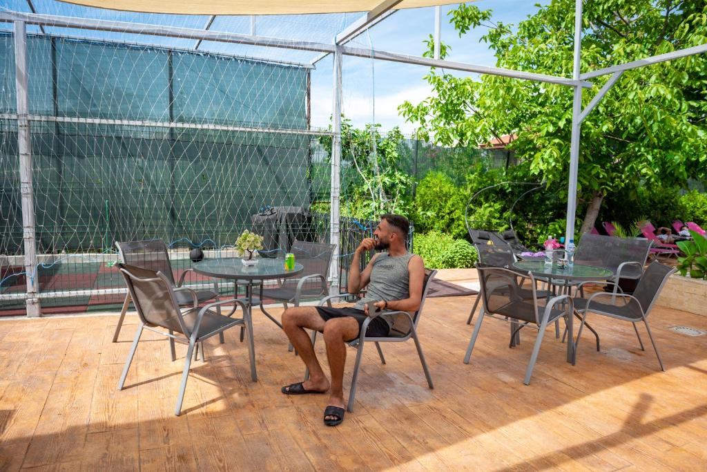 Patio nebo venkovní prostory v ubytování PENSIUNEA LAINER
