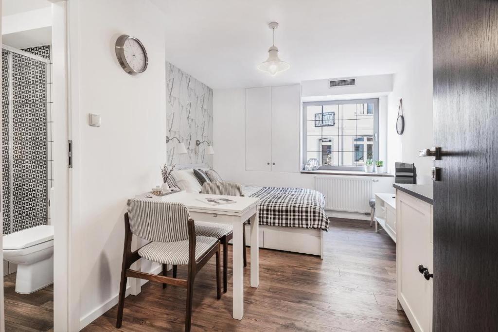 Posteľ alebo postele v izbe v ubytovaní Happy Stay Tartaczna Residence I