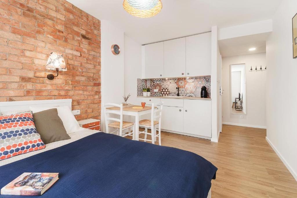 Kuchyňa alebo kuchynka v ubytovaní Happy Stay Tartaczna Residence I