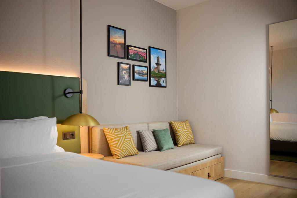 Postel nebo postele na pokoji v ubytování Hilton Garden Inn Leiden