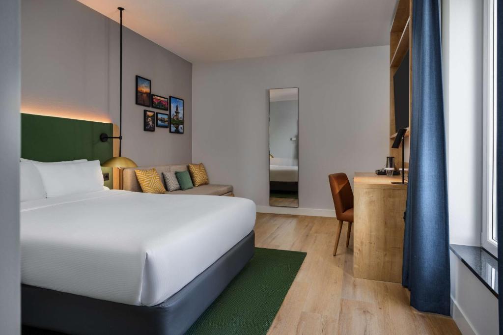Postel nebo postele na pokoji v ubytování Hilton Garden Inn Leiden