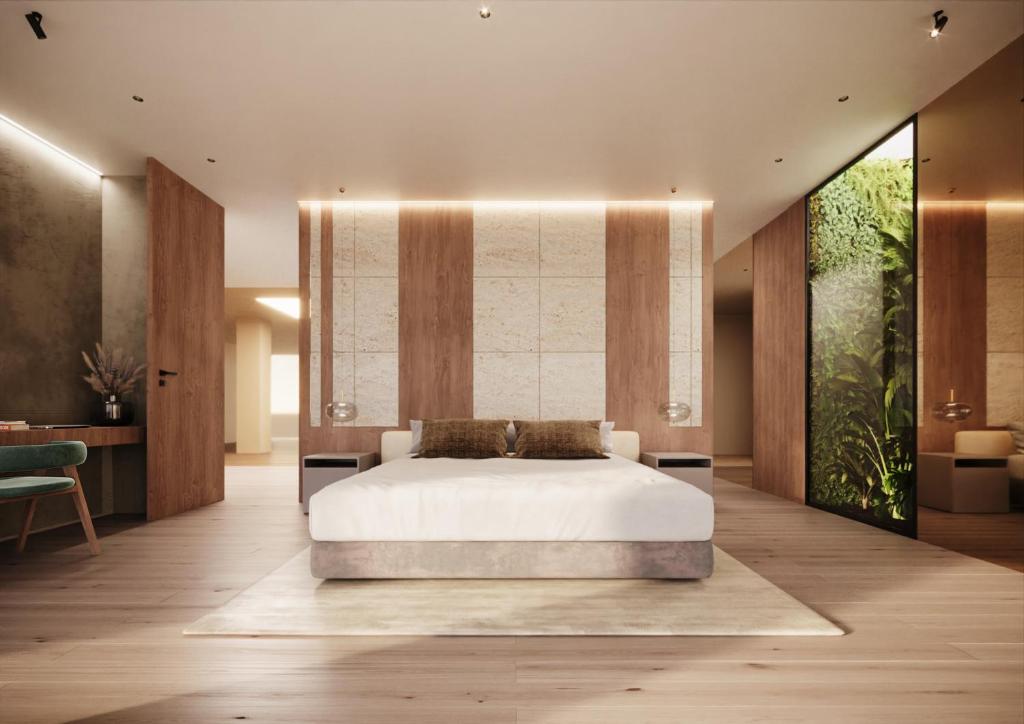 Postel nebo postele na pokoji v ubytování Hotel Terme Neroniane