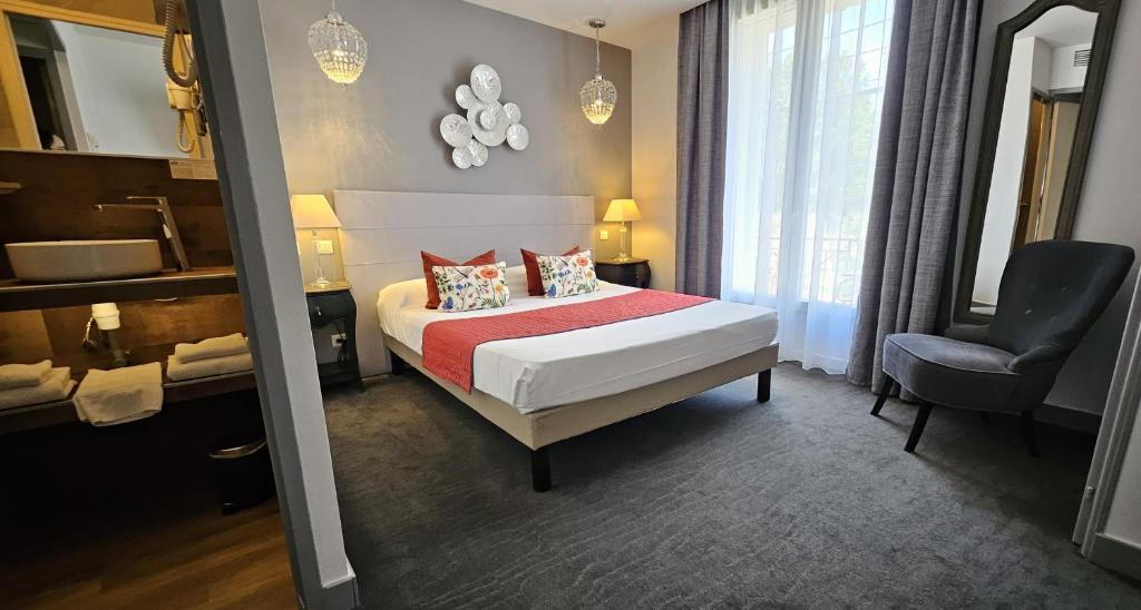 Postel nebo postele na pokoji v ubytování Brit Hotel Acacias