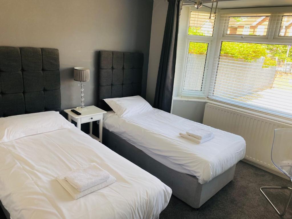 Postel nebo postele na pokoji v ubytování Wessex House