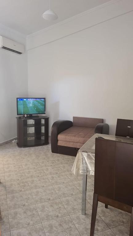 TV a/nebo společenská místnost v ubytování House Vladimiros