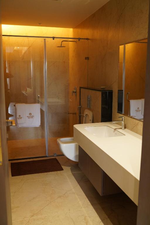 Koupelna v ubytování VANTARA SUITEs