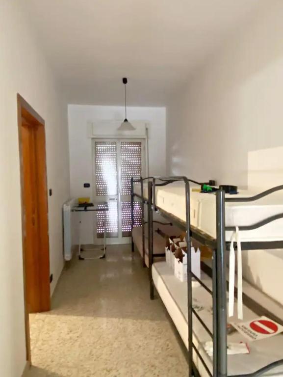 Postel nebo postele na pokoji v ubytování GIOIA House