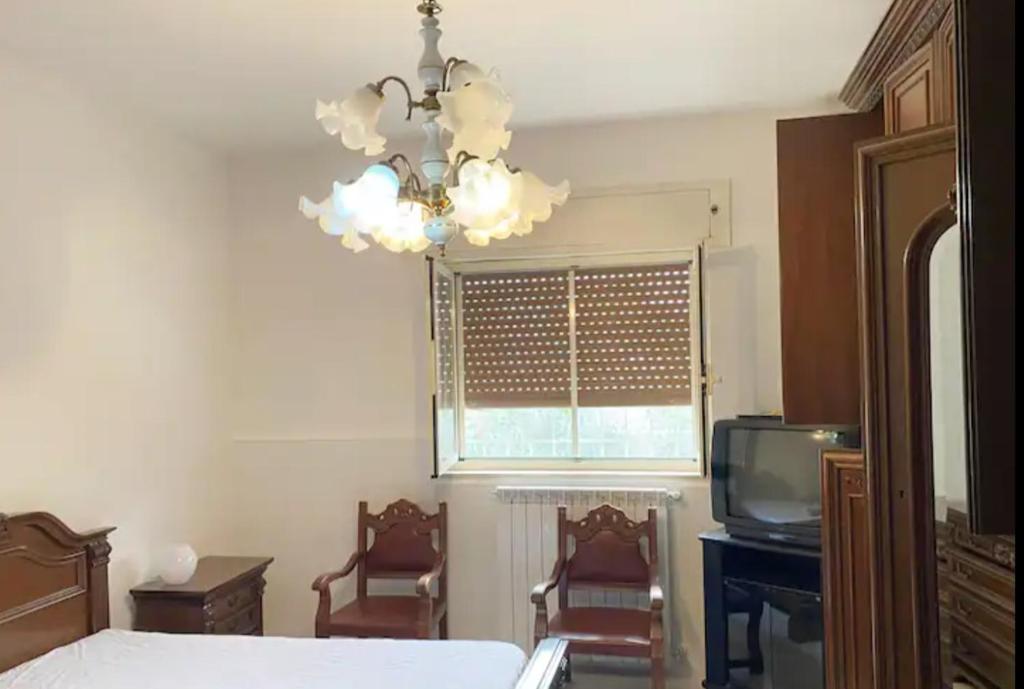 Postel nebo postele na pokoji v ubytování GIOIA House