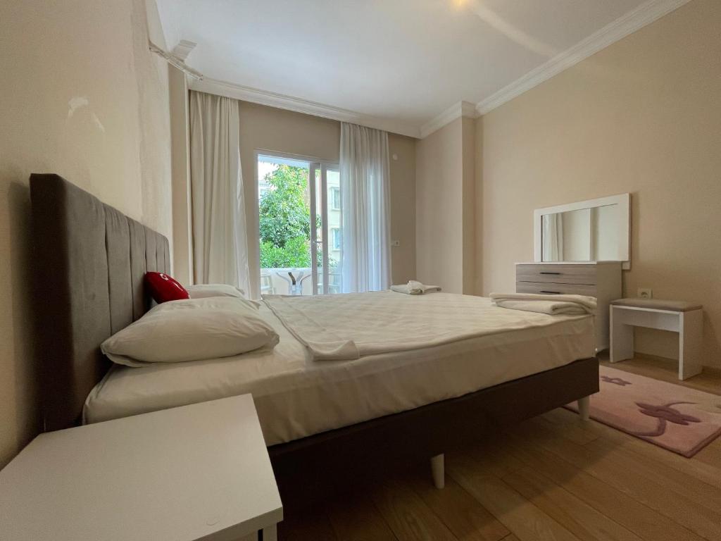 Postel nebo postele na pokoji v ubytování Select Suite & Apart Hotel