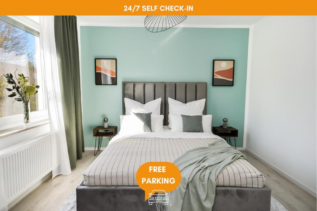 a bedroom with a bed with a free parking sign on it at AT WEINMEISTER - Gemütlichkeit & Ruhe in Gütersloh