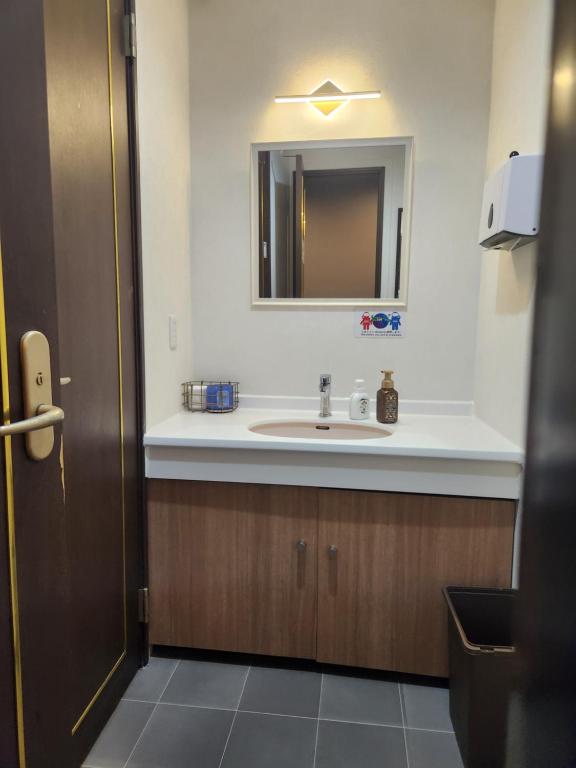 Koupelna v ubytování Hotel Galaxy Pod