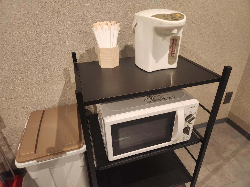 Kuchyň nebo kuchyňský kout v ubytování Hotel Galaxy Pod