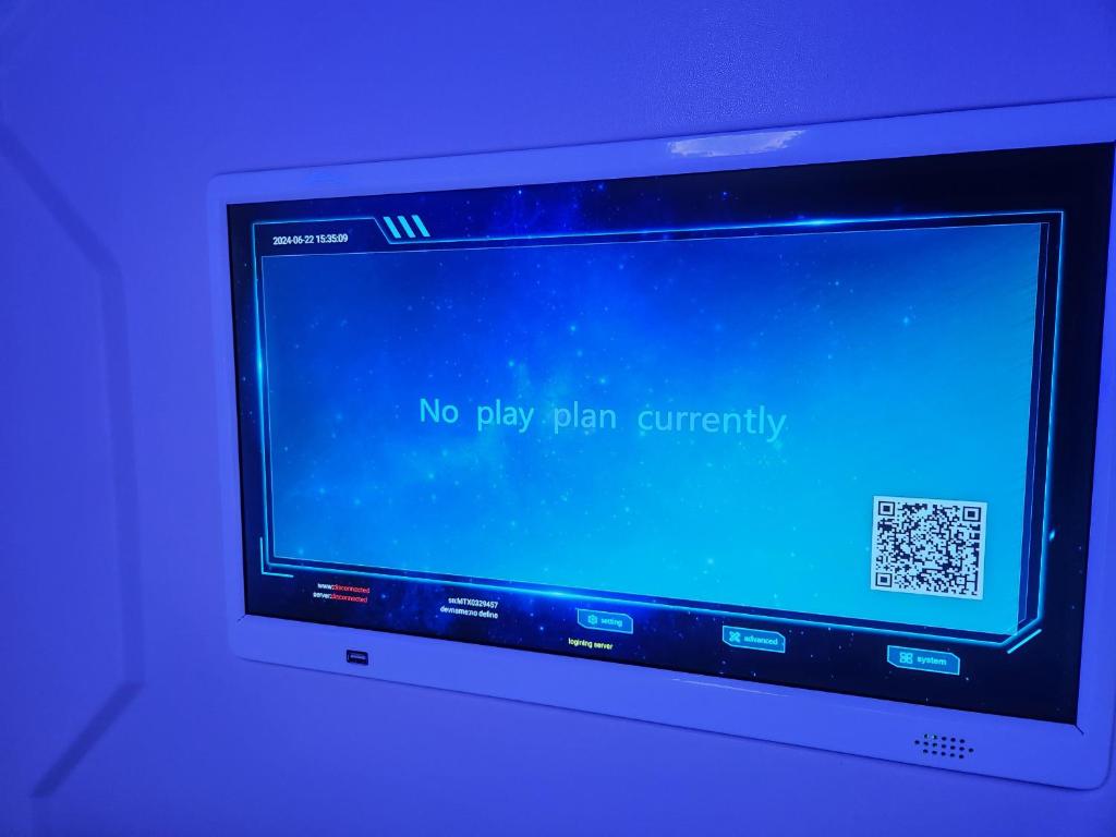 TV a/nebo společenská místnost v ubytování Hotel Galaxy Pod
