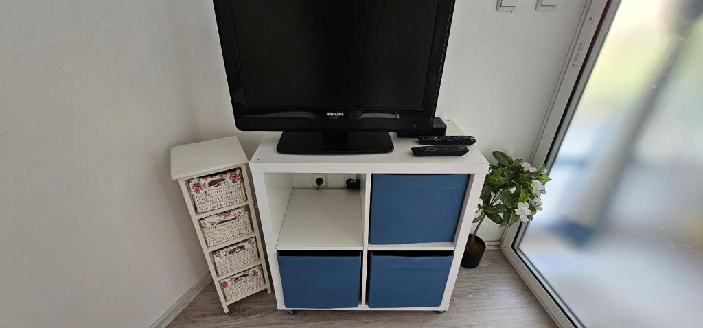 TV a/nebo společenská místnost v ubytování VP Blue Summer