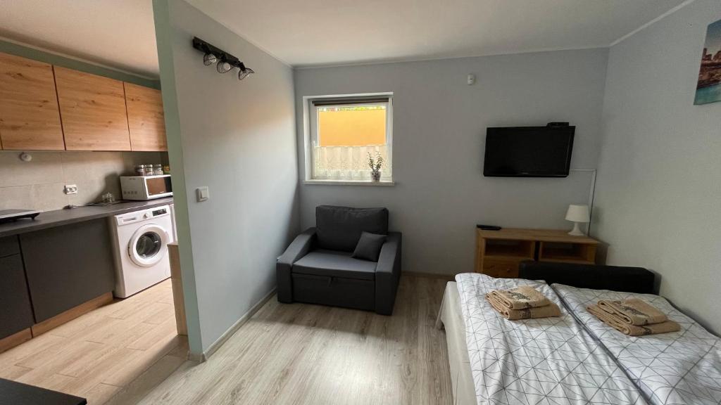 Kuchyň nebo kuchyňský kout v ubytování Apartament U Waldka