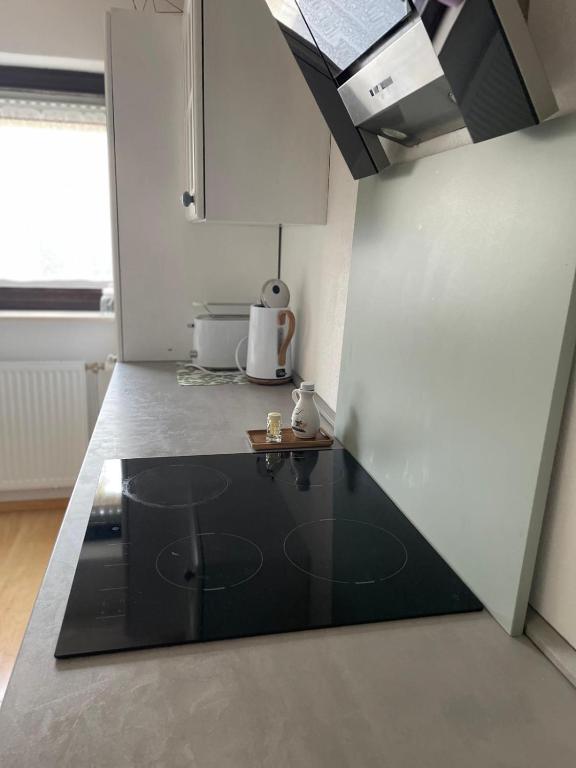 Kuchyň nebo kuchyňský kout v ubytování Gemütliche Wohnung am Tor zum Schwarzwald
