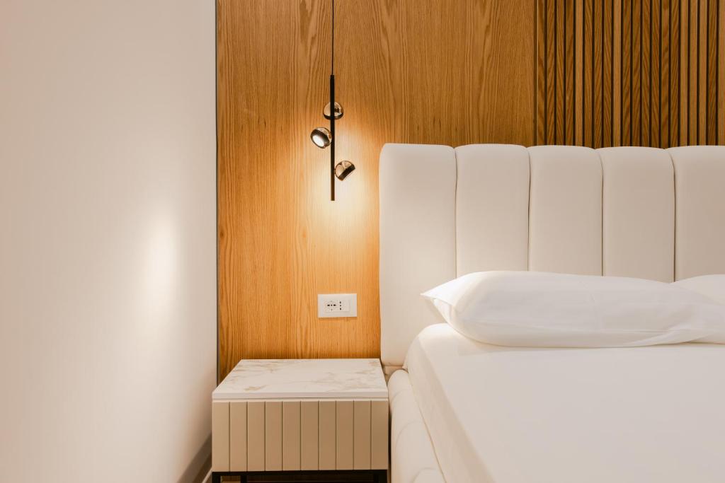 Postel nebo postele na pokoji v ubytování Hotel Olsi