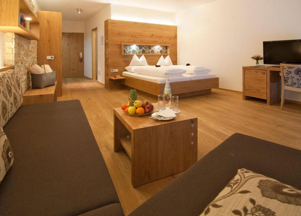 Postel nebo postele na pokoji v ubytování Panoramahotel Watles