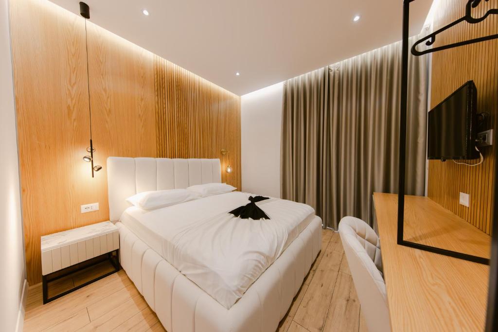 Postel nebo postele na pokoji v ubytování Hotel Olsi