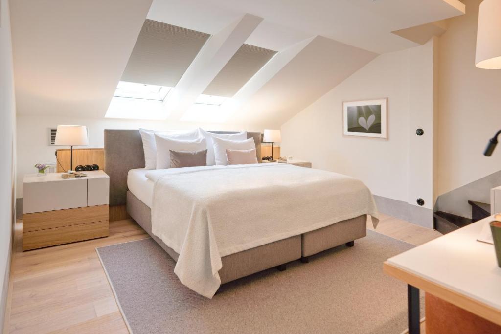 Postel nebo postele na pokoji v ubytování Hotel BOOKQUET