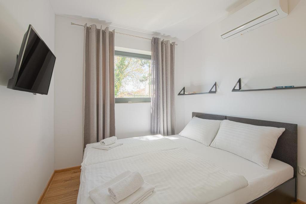 Posteľ alebo postele v izbe v ubytovaní Elements Camping Selce Mobile homes