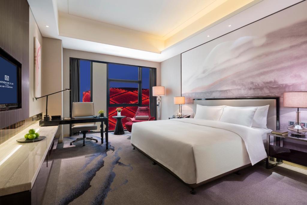 Letto o letti in una camera di Wanda Realm Wuhan