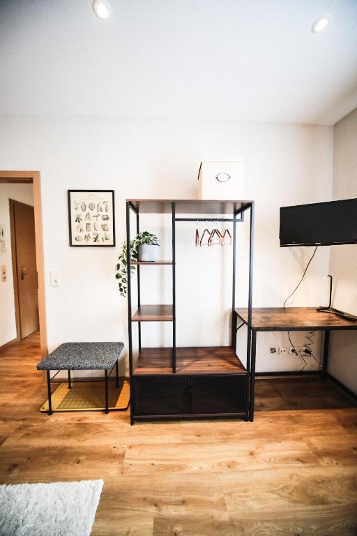 TV a/nebo společenská místnost v ubytování Ferienwohnung in Lengefeld