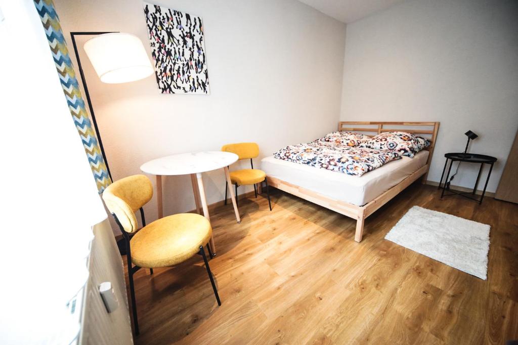 Postel nebo postele na pokoji v ubytování Ferienwohnung in Lengefeld