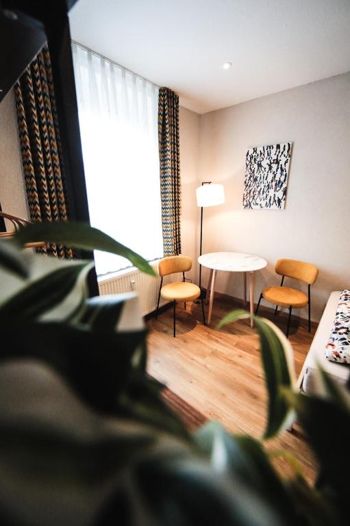 Posezení v ubytování Ferienwohnung in Lengefeld