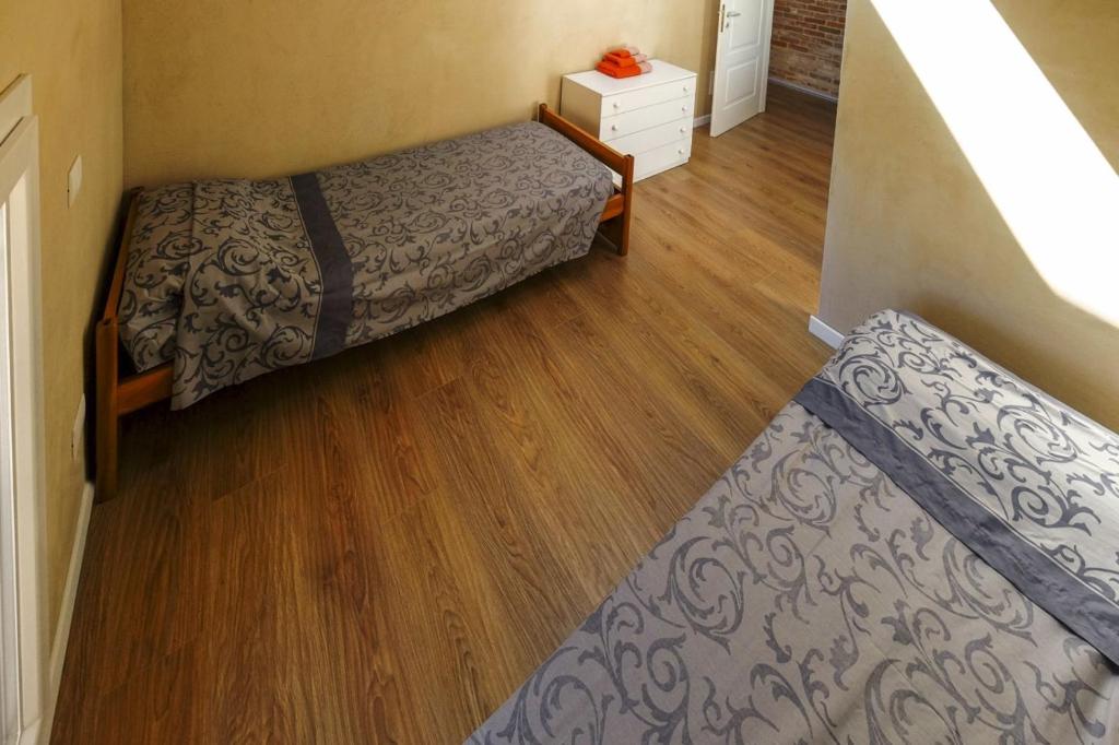 Posteľ alebo postele v izbe v ubytovaní Chez Alberto