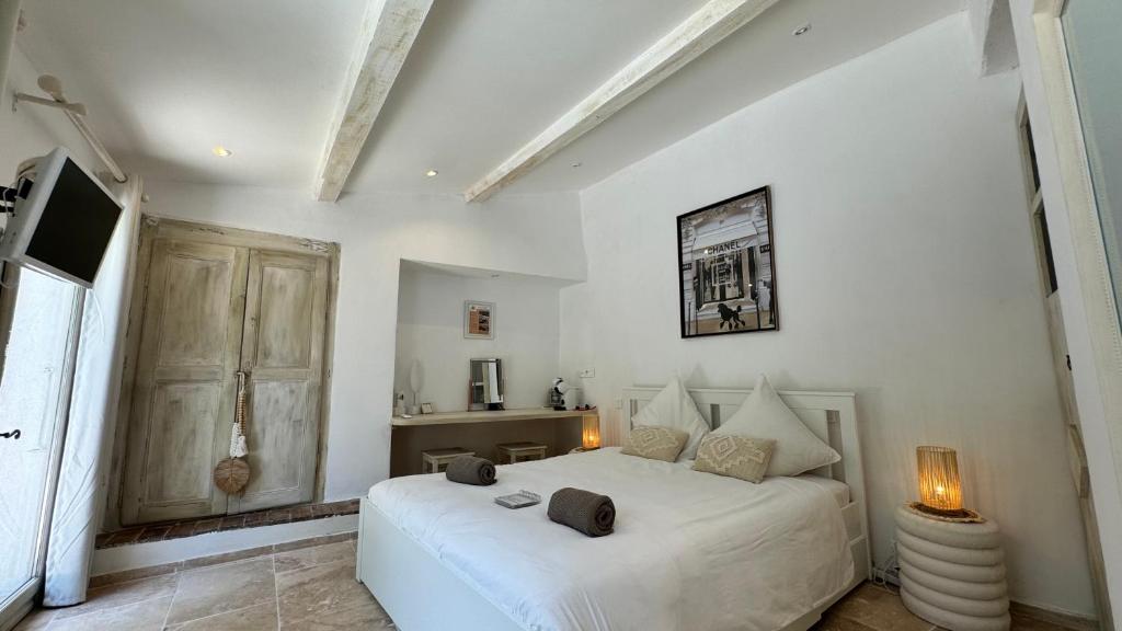 Posteľ alebo postele v izbe v ubytovaní B&B Maison Gigi