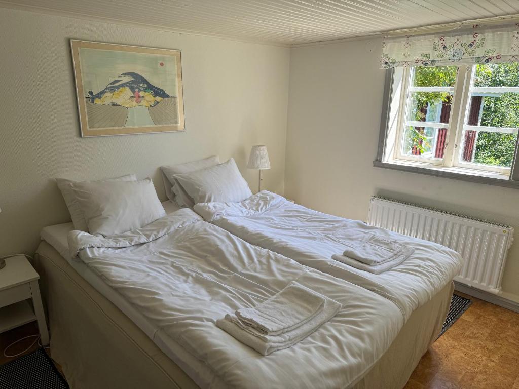 Postel nebo postele na pokoji v ubytování Kackelstugan