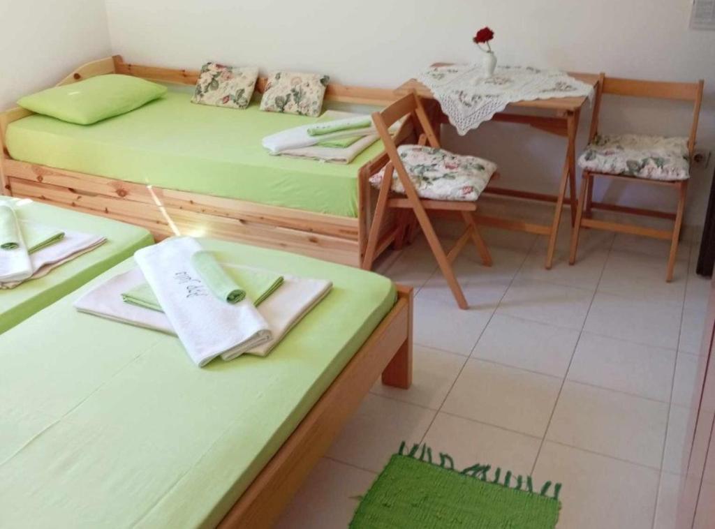 Postel nebo postele na pokoji v ubytování Apartments Julia